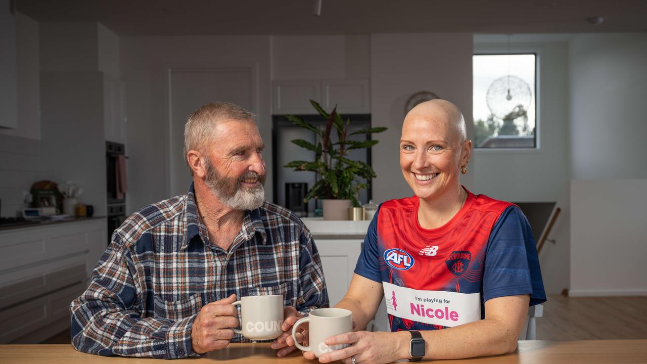 Nicole Riddle, 41, pictured with her father Graeme Gellie. Picture: Brad Fleet