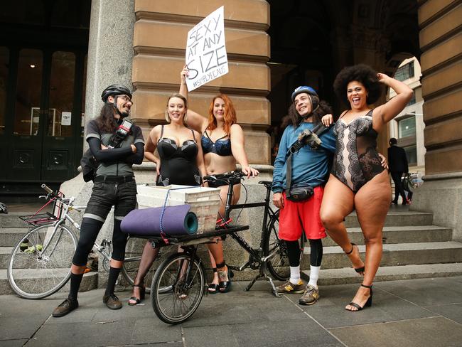 The ladies were more than happy to pose for photos with stunned bystanders. Picture: Richard Dobson