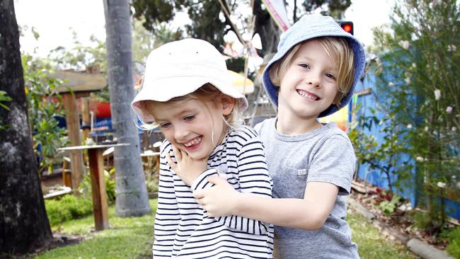 Twins Mila, 4, left, and Zach, 4, at Paradise Point Kindyland. The pair are one of many to pass through the popular childcare centre that’s been operating for three decades. Picture: Tertius Pickard