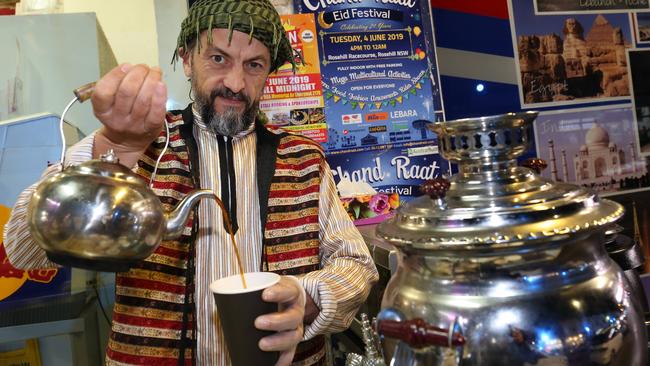 Mamdouh Hammal serves a traditional black tea. Picture: Robert Pozo