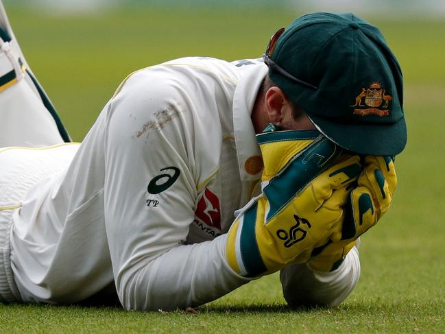 Australia's captain Tim Paine reacts after a teamamte failed to make a catch during play on the first day of the fifth Ashes cricket Test match between England and Australia at The Oval in London on September 12, 2019. (Photo by Adrian DENNIS / AFP) / RESTRICTED TO EDITORIAL USE. NO ASSOCIATION WITH DIRECT COMPETITOR OF SPONSOR, PARTNER, OR SUPPLIER OF THE ECB