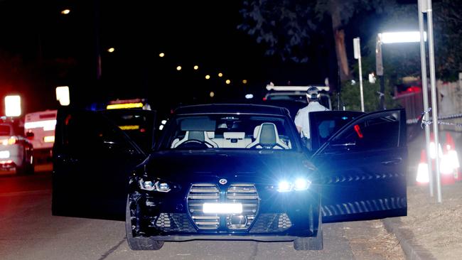 A black BMW at a crime scene on Factory Street in Granville. Picture: Damian Shaw