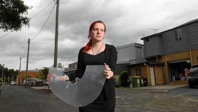 TRAIL OF EVIDENCE: Geraldine Willis found her beloved pet cat Marcie had been mauled to death by dogs and this white plastic dog collar. next to her. Picture: Marc Stapelberg