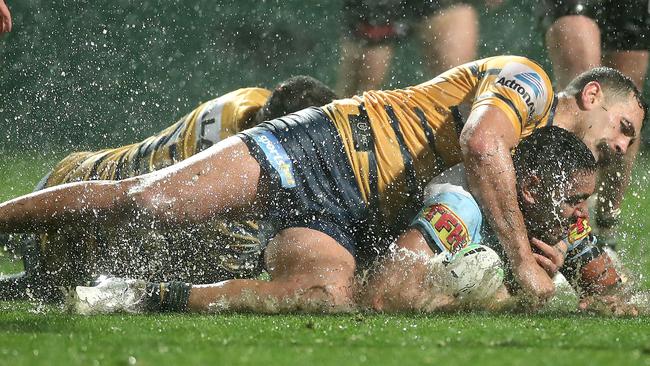 SYDNEY, AUSTRALIA - AUGUST 09: Jesse Ramien of the Sharks is tackled during the round 13 NRL match between the Cronulla Sharks and the Parramatta Eels at Netstrata Jubilee Stadium on August 09, 2020 in Sydney, Australia. (Photo by Cameron Spencer/Getty Images)