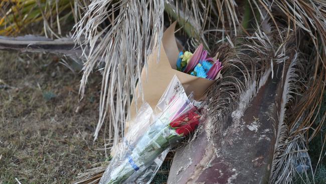 Flowers at the Bray Park crash scene. Picture: Annette Dew