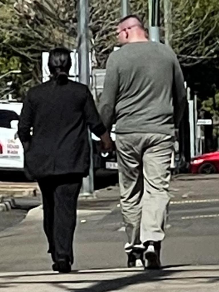 Luke James Petrides leaves Toowoomba Courthouse with his partner after being sentenced in Toowoomba Magistrates Court.