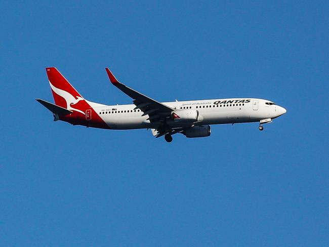 SYDNEY, AUSTRALIA - NewsWire Photos, SEPTEMBER, 12 2021: Qantas fly's over Bronte Beach in Sydney: NCA NewsWire / Gaye Gerard