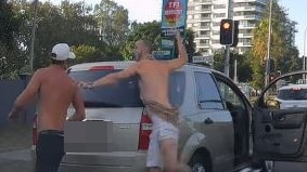 Dashcam footage has captured a road rage brawl on the Gold Coast.