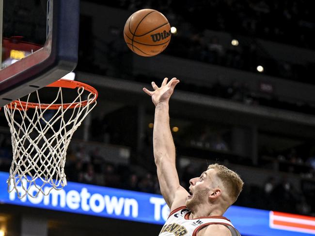 Jack White (10) of the Denver Nuggets scores against the Phoenix Suns during the fourth quarter of Denvers 126-97 win at Ball Arena in Denver on January 11, 2023. Photo: AAron Ontiveroz/MediaNews Group/The Denver Post via Getty Images.