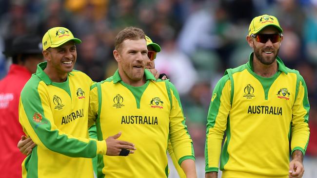 Aaron Finch (c) celebrates taking the wicket of Mohammad Hafeez. Picture: Getty