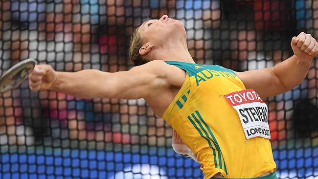 Dani Stevens launches the discus at the world championships. Picture: AFP Photo