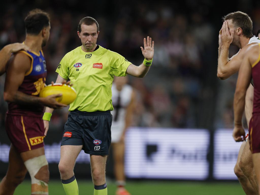 Dougal Howard of the Saints can’t believe umpire Nicholas McGinness paid a free kick against him in the final term. Picture: Michael Klein