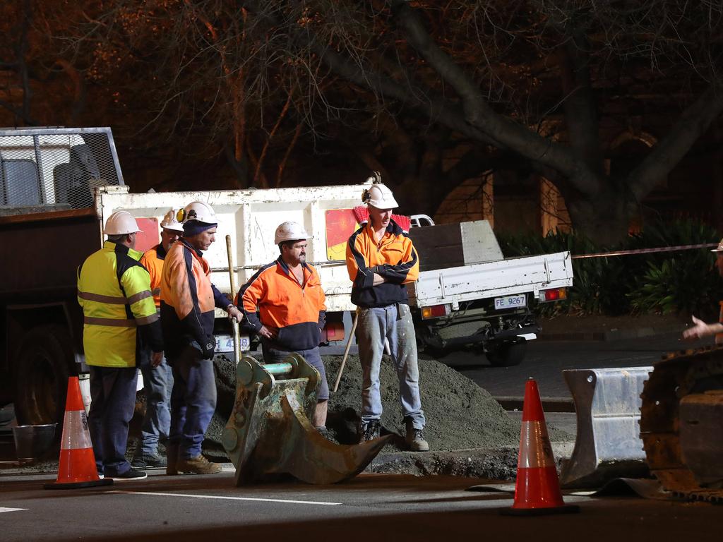 Work in Macquarie Street Hobart on the hole that will house the chamber performance artist Mike Parr will live in for 72 hours during Dark Mofo. Picture: NIKKI DAVIS-JONES