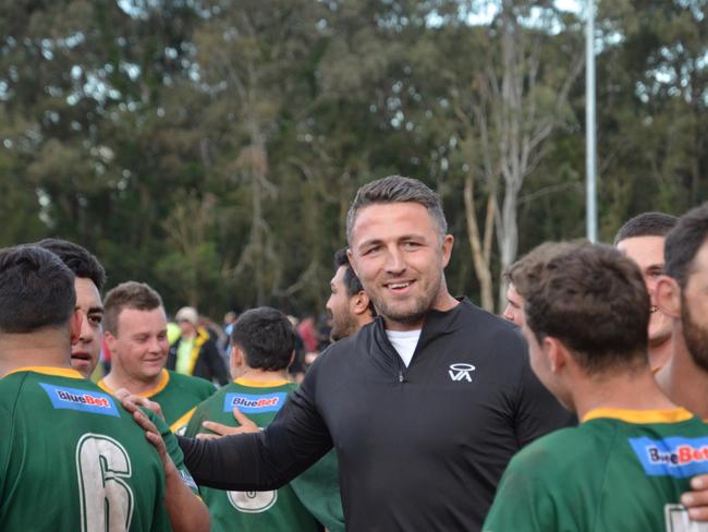 Sam Burgess shares a laugh with his troops. Photo: Orara Valley Axemen