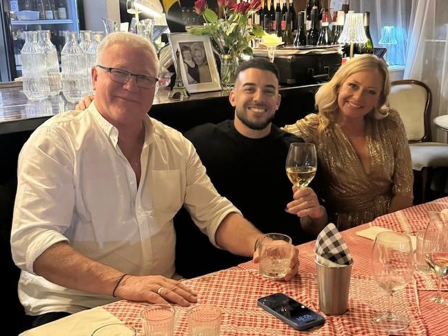 Adrian Portelli with Scott Cam and Shelley Craft having dinner on Phillip Island on Thursday. Picture: Supplied