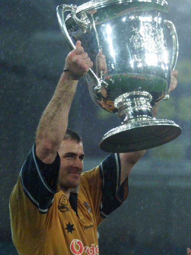 David Wilson holds the Bledisloe Cup trophy in 1999.