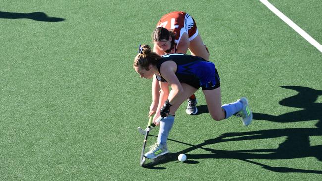 North West Sydney tackles against Newcastle at NSW 18s Girls Hockey Championships, May 21.