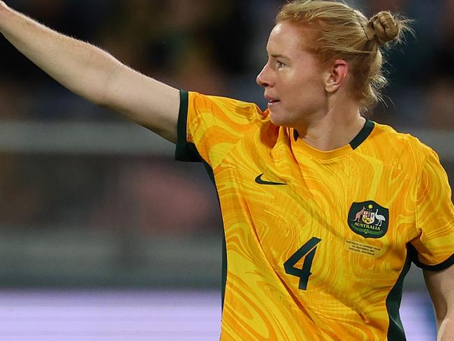 GEELONG, AUSTRALIA - DECEMBER 07: Clare Polkinghorne of Australia acknowledges the crowd after been substituted in her final match during the International Friendly Match between the Australia Matildas and Chinese Taipei at GMHBA Stadium on December 07, 2024 in Geelong, Australia. (Photo by Morgan Hancock/Getty Images)