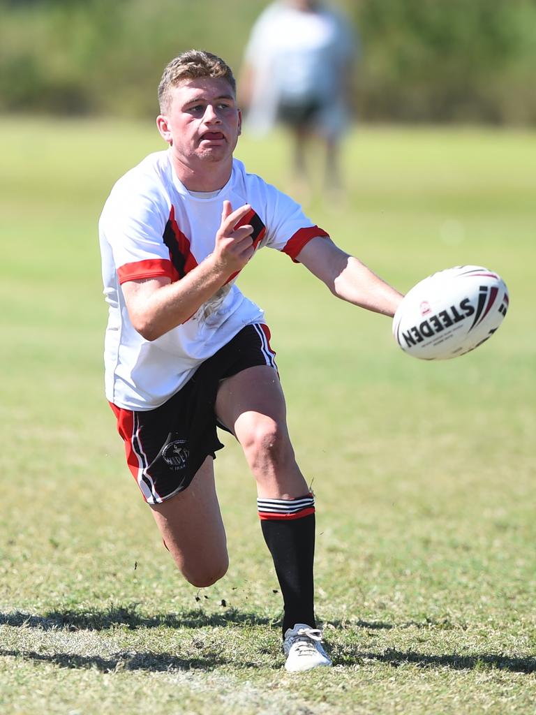 Boys Rugby League State Championship held at Northern Division, Brothers Leagues ground, Townsville. South West (black) v Wide Bay (white). 16-18 years. Fletch Prendergast of Kingaroy SHS.