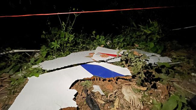 Pieces of wreckage found at the crash site in Tengxian County, China. Picture: Getty Images