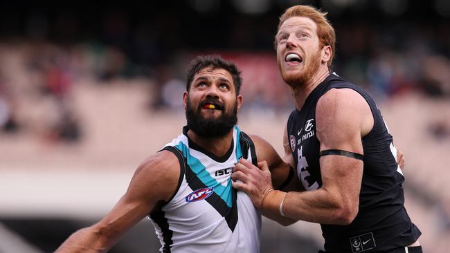 Port Adelaide ruckman Patrick Ryder jostles with Carlton's Andrew Phillips. Picture: Michael Klein