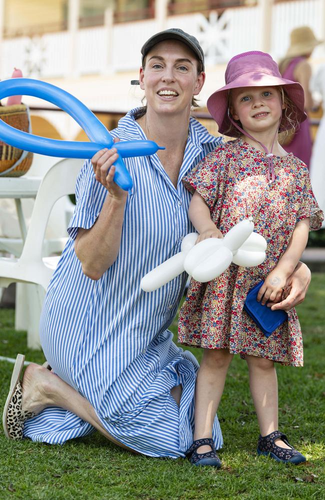 Rachel Wise and daughter Margot Wise play with balloon sculptures at Fairholme Spring Fair, Saturday, October 19, 2024. Picture: Kevin Farmer