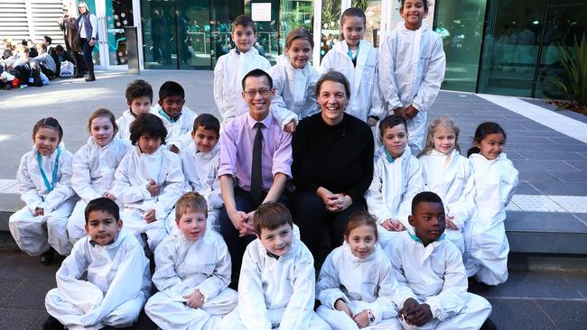 Eddie Woo and Michelle Simmons surrounded by Year 2 students at St Mary of the Cross Catholic Primary, Point Cook. Picture: John Feder