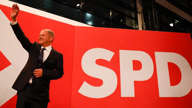 Social Democrats (SPD) candidate for Chancellor, Olaf Scholz, waves to supporters. Picture: AFP