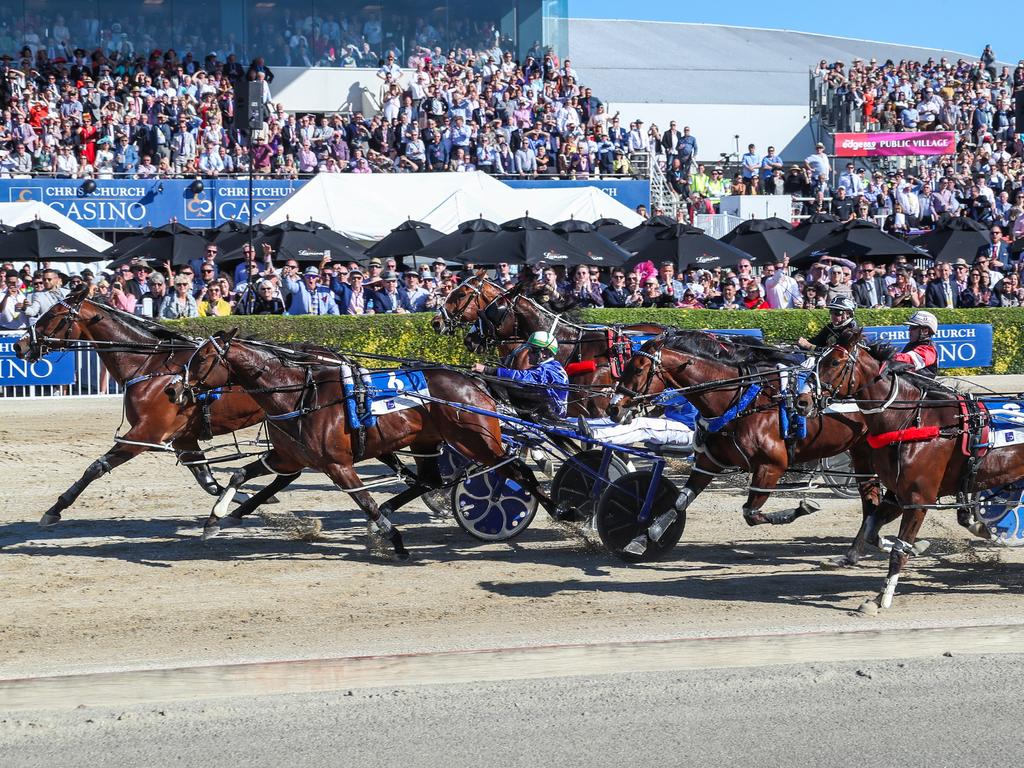 Cruz Bromac overhauls race favourite Spankem to claim the Group 1 New Zealand Cup. Picture: Harness Racing New Zealand