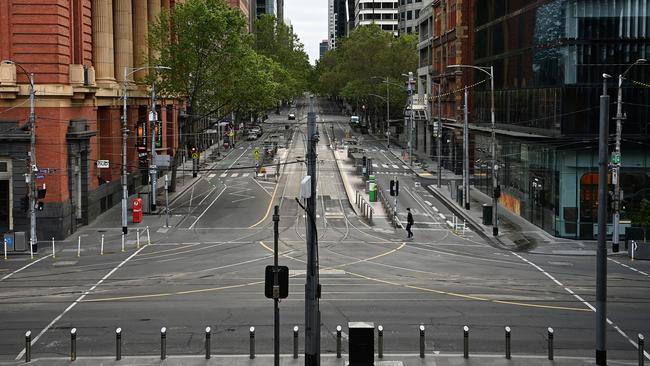 An empty Bourke Street in Melbourne’s CBD. ACCI chief executive Andrew McKellar says ‘we now have a once-in-a-­generation opportunity to pursue landmark reform’. Picture: Getty Images