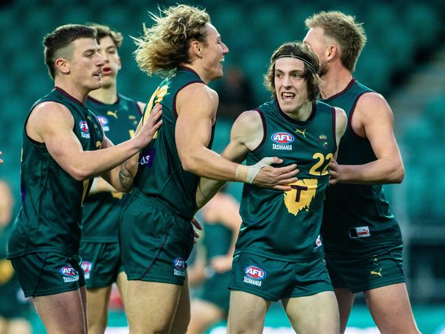 Brandon Leary is congratulated after kicking a goal for Tasmania earlier this year. Picture: Linda Higginson/AFL Tasmania