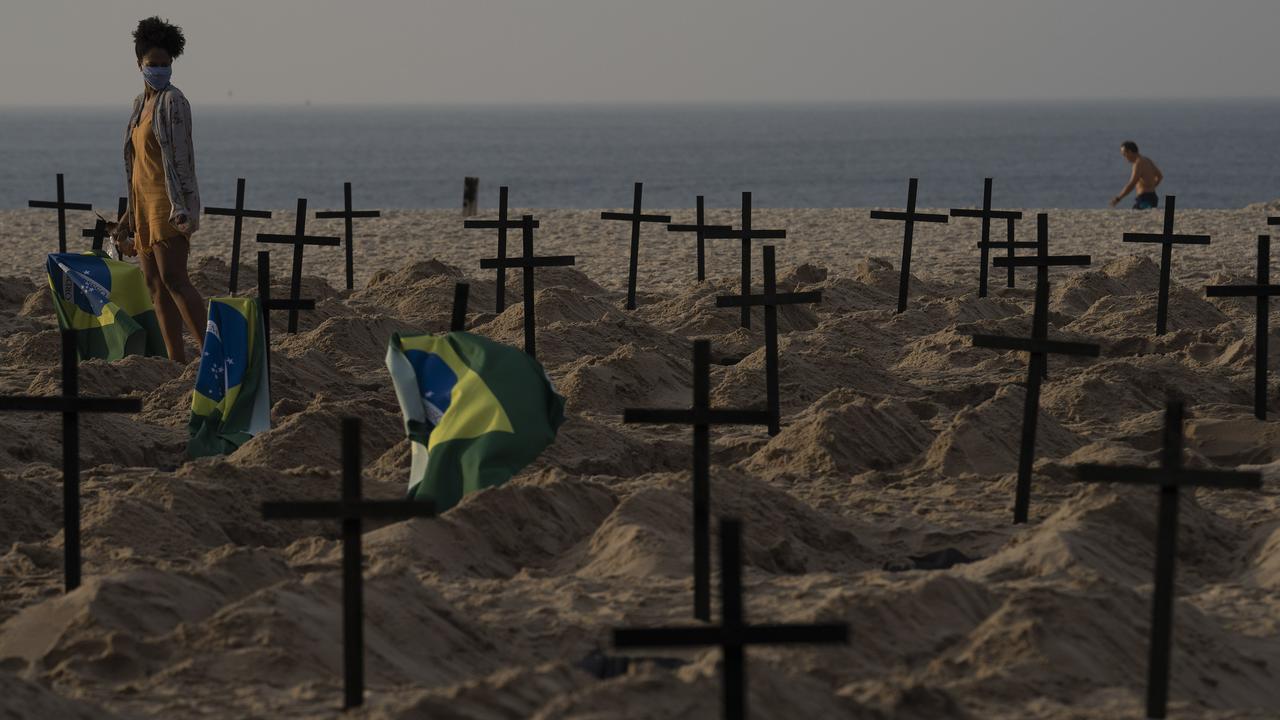 The graves were built in protest against the government’s handling of the pandemic. Picture: Leo Correa/AP