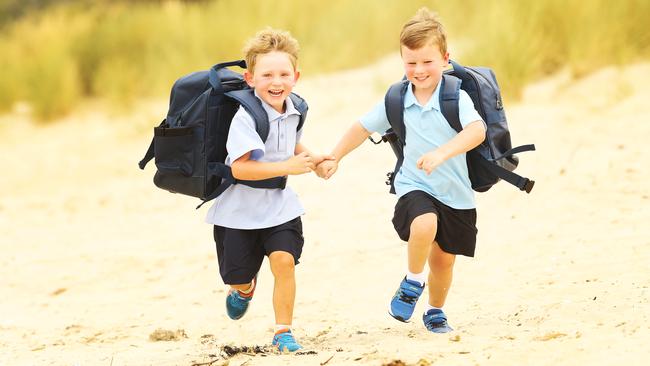 Friends Noah Williams, 4 and Lachie Cato, 4 both of Acton Park are excited for their first day of kinder at Cambridge Primary School. Picture: ZAK SIMMONDS