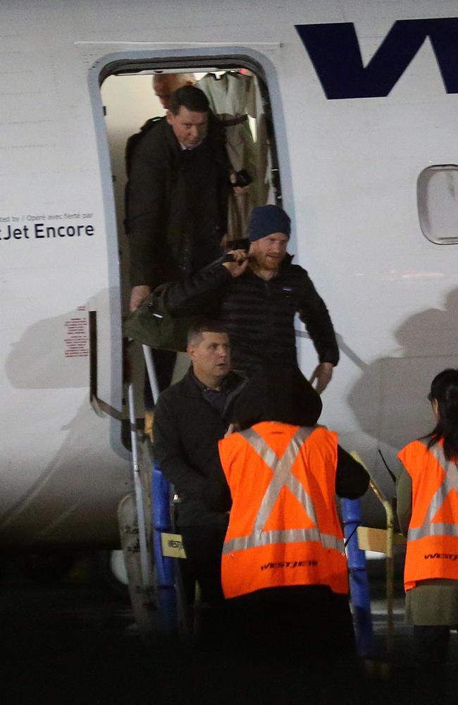 The Duke of Sussex arrives in Canada with his personal protection officers. Picture: Cosmo/ BACKGRID