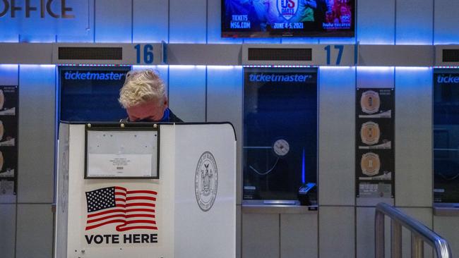 A person fills out their voting form at Madison Square Garden polling station. Picture: David Dee Delgado