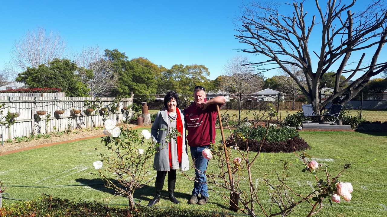 Rob Kennedy will open his garden to the public on Sunday, July 28, in the lead-up to the Chronicle Garden Competition. He is pictured here with Cr Nancy Sommerfield. Picture: Contributed