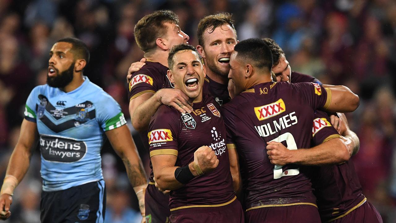 Billy Slater of the Maroons (centre) reacts after Daly Cherry-Evans scores a try during Origin III.