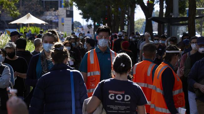 People queue at the NSW Health mass vaccination hub in Sydney’s Homebush. Picture: Getty Images