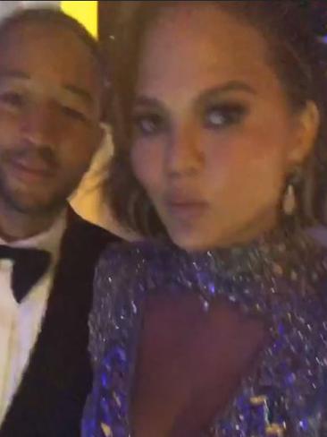 Couple goals as Chrissy Teigen arrives at a party in style with hubby John Legend.