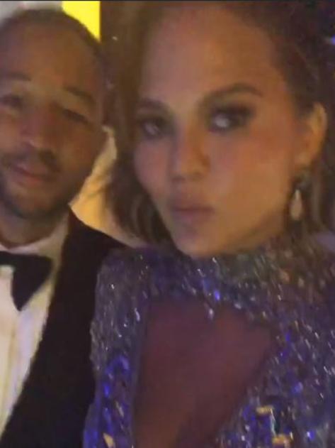 Couple goals as Chrissy Teigen arrives at a party in style with hubby John Legend.