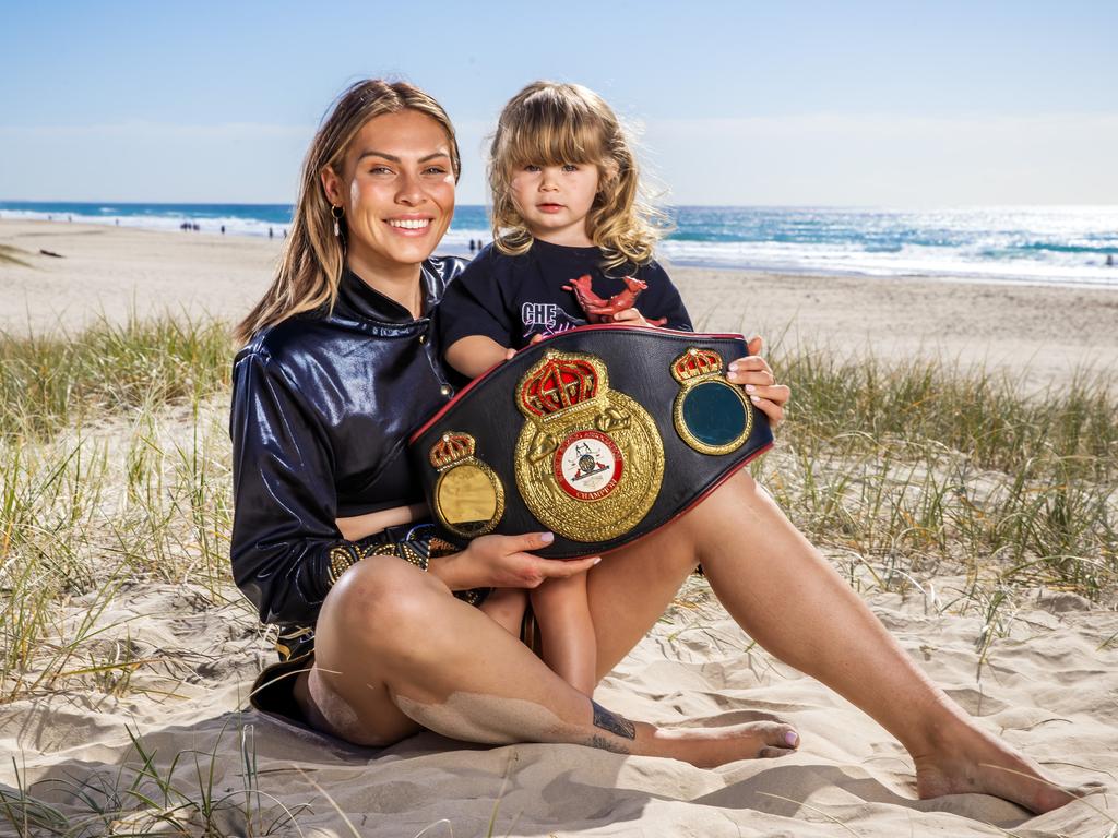 Model turned boxer Che Kenneally with her daughter Havana, 2. Picture: Nigel Hallett.