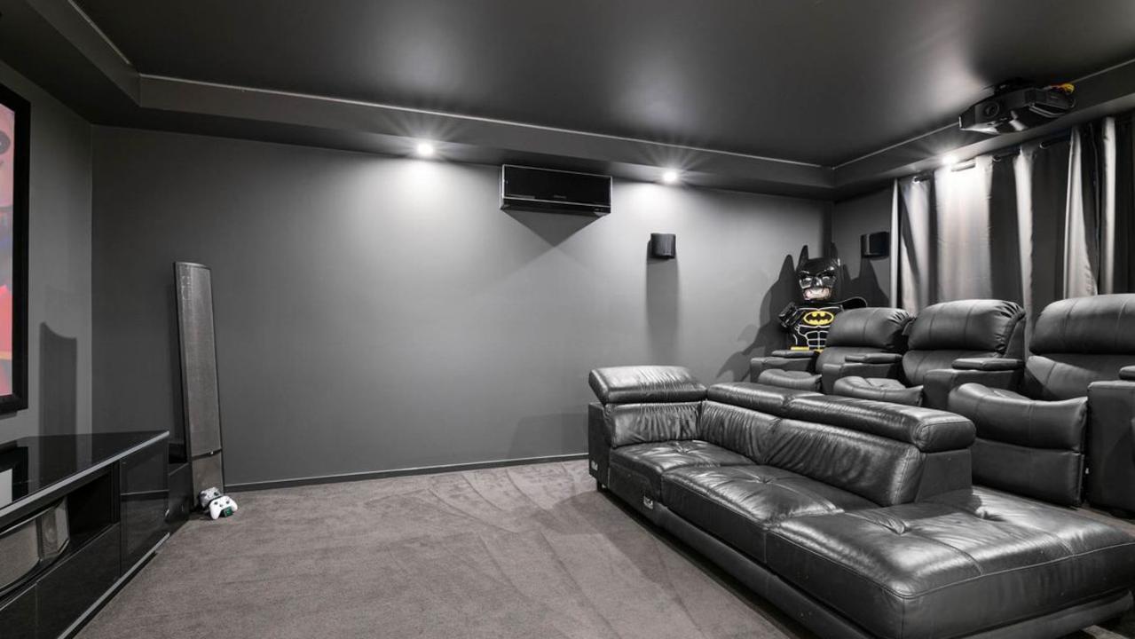 The seven-seat cinema in the home has been home to a 150cm-tall fibreglass Lego Batman.