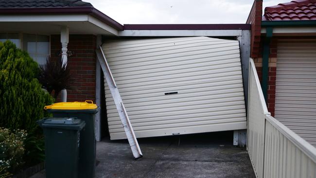 A damaged roller door at Altona Meadows. Picture: Norm Oorloff