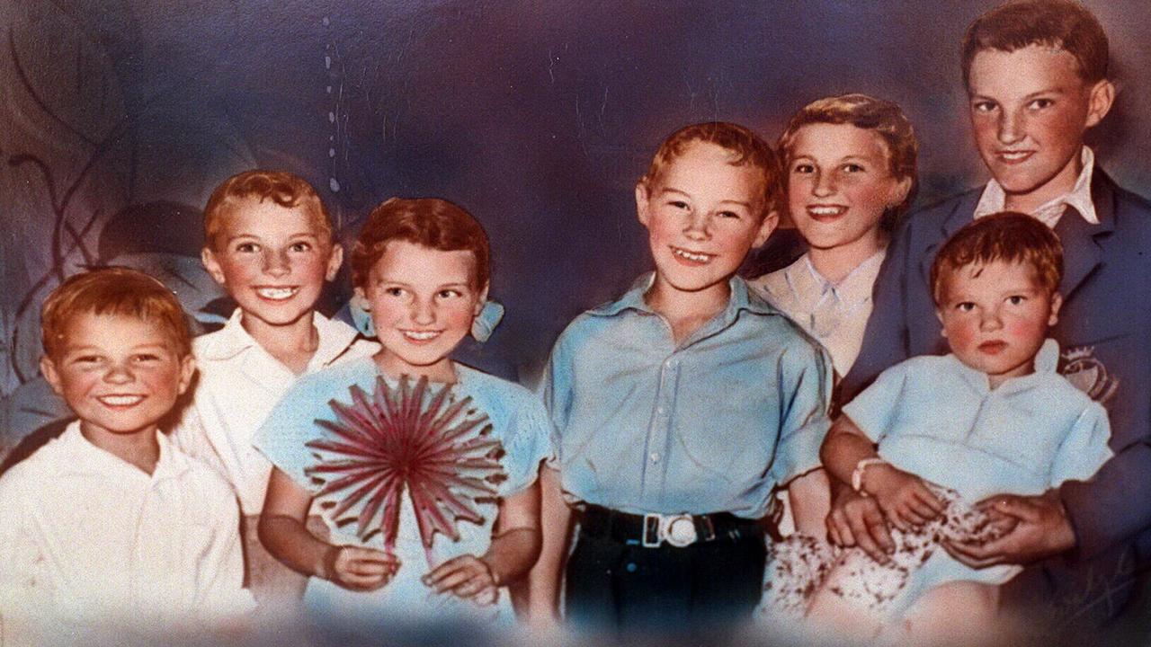 Ivan Milat (blue shirt) in 1954, aged 10, with siblings (from left) Michael, William, Shirley, Mary and Alex holding Walter at their Moorebank home.