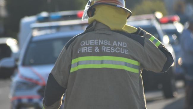 A QFES firefighter at work. File image. Picture: Lillian Watkins