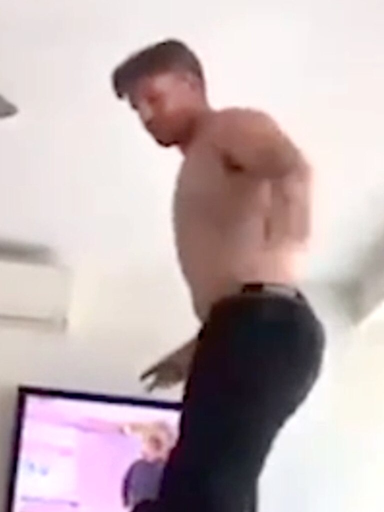 Melbourne Storm player Cameron Munster pictured dancing on a table.