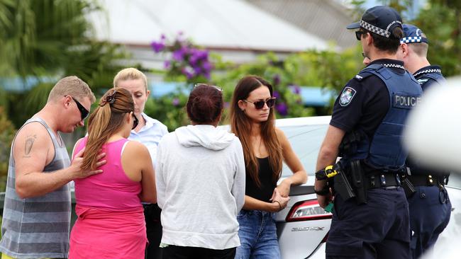 The victim's family talking to police. Picture: Tara Croser.