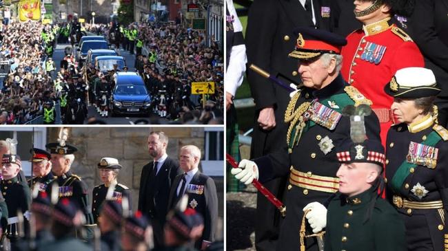 Charles guards coffin as mourners file past