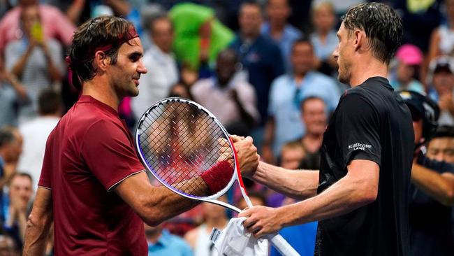 Millman after a touch match with Roger Federer.