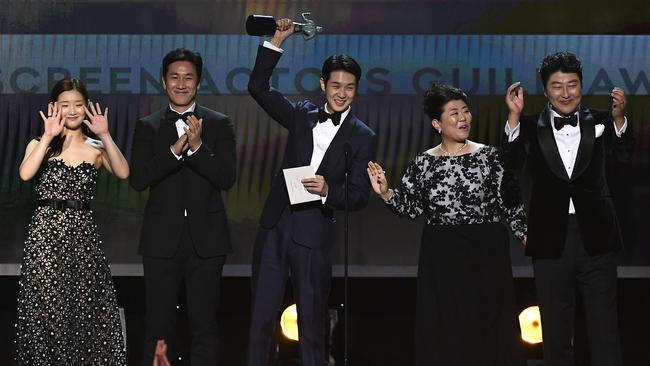 Park So-dam, left, with Parasite co-stars accept Outstanding Performance by a Cast in a Motion Picture during the Screen Actors Guild Awards last year. Picture: Kevork Djansezian/Getty Images